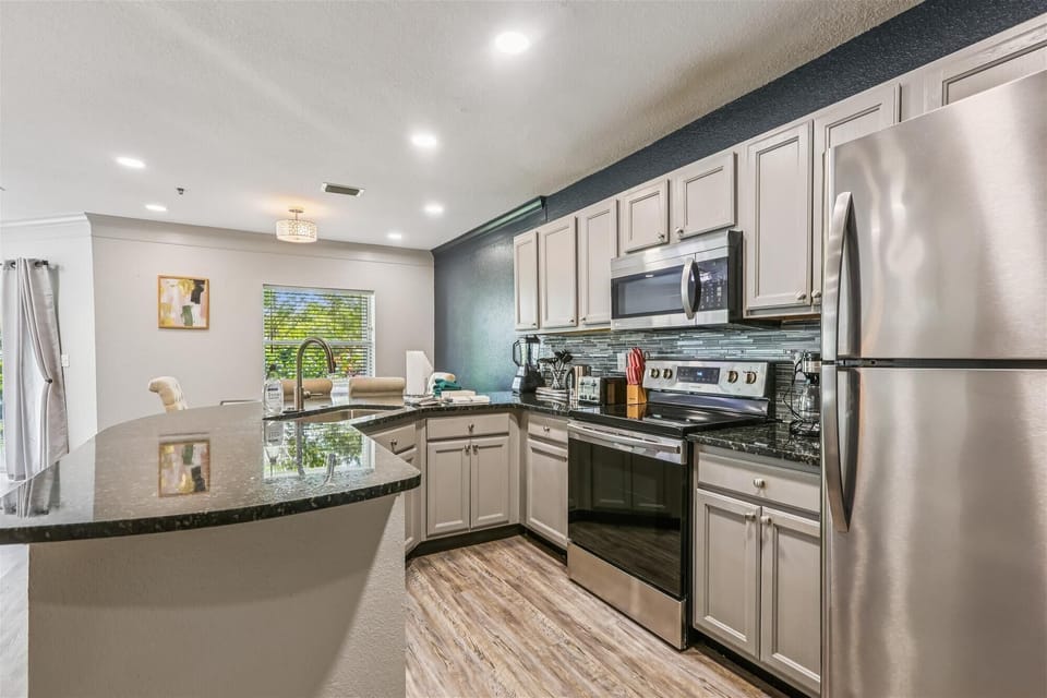 Condo, Multiple Beds, Hot Tub, Pool View (Ocean Gate I104) | Private kitchen | Coffee/tea maker