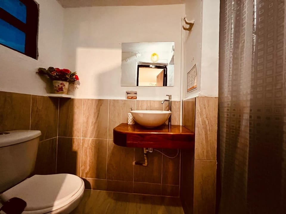 Family Room, Balcony | Bathroom | Shower, towels, soap, toilet paper
