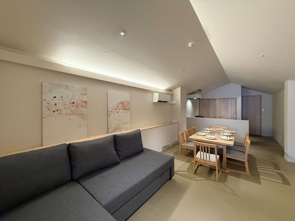 Luxury Apartment | Living area | 55-inch Smart TV with cable channels