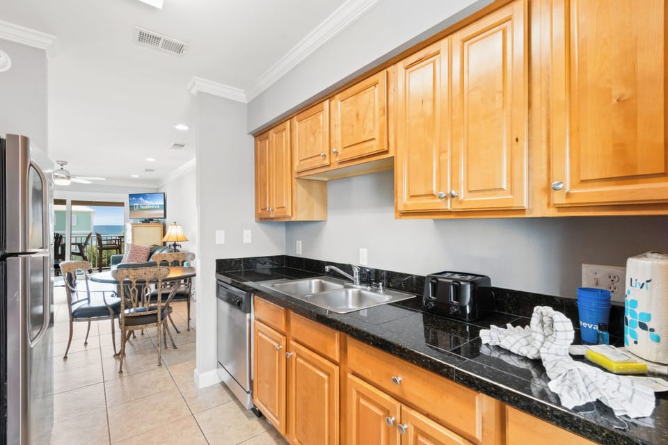 Signature Condo, Non Smoking, Balcony | Private kitchen | Fridge, microwave, oven, stovetop