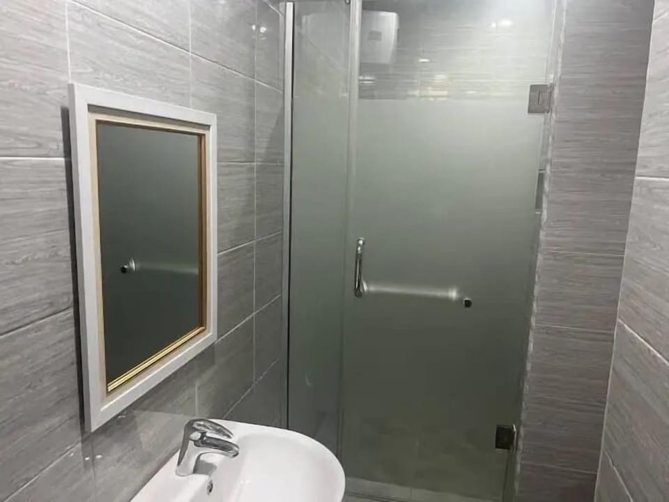 Family Apartment, Balcony, City View | Bathroom | Free toiletries, hair dryer, towels, soap