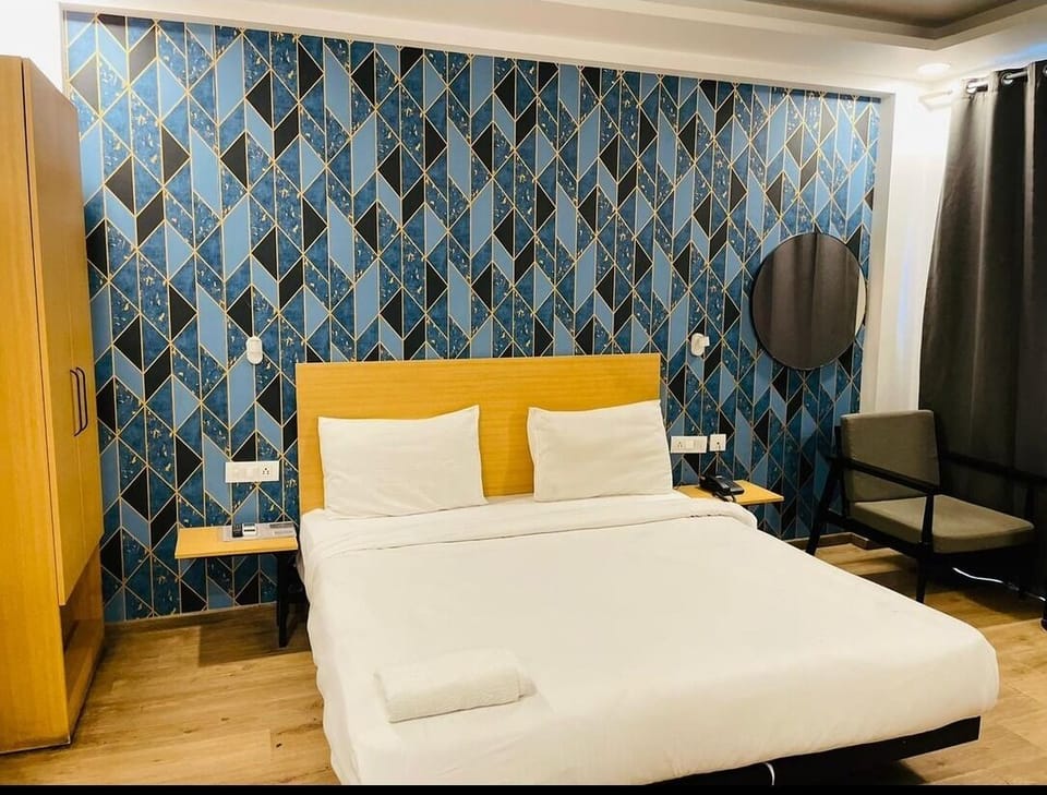 Deluxe Double Room, Balcony, City View | Desk, laptop workspace, free WiFi