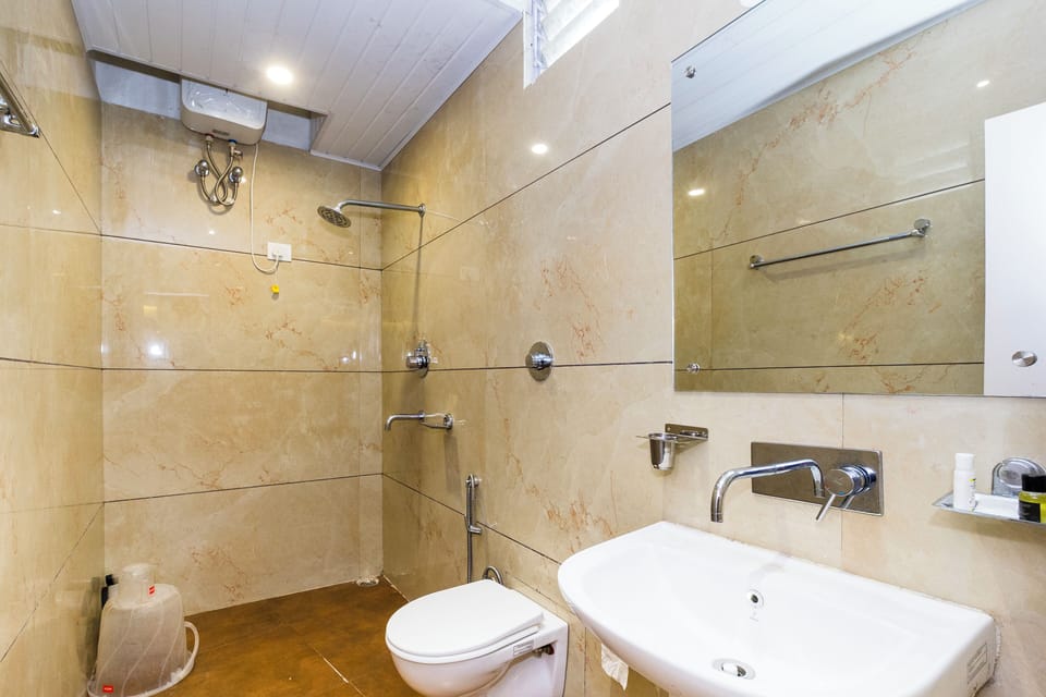 Shower, hair dryer (on request), slippers, towels