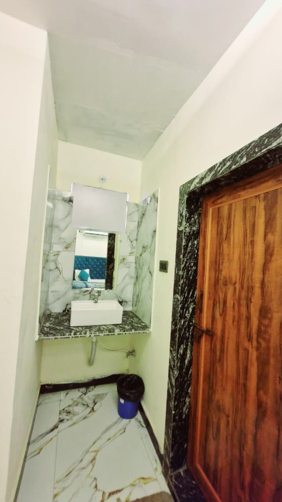 Shower, designer toiletries, slippers, towels