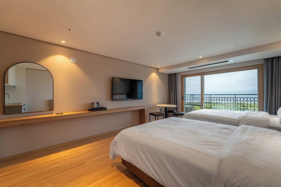 Family Twin Room, Sea View | Pillowtop beds, free WiFi, bed sheets