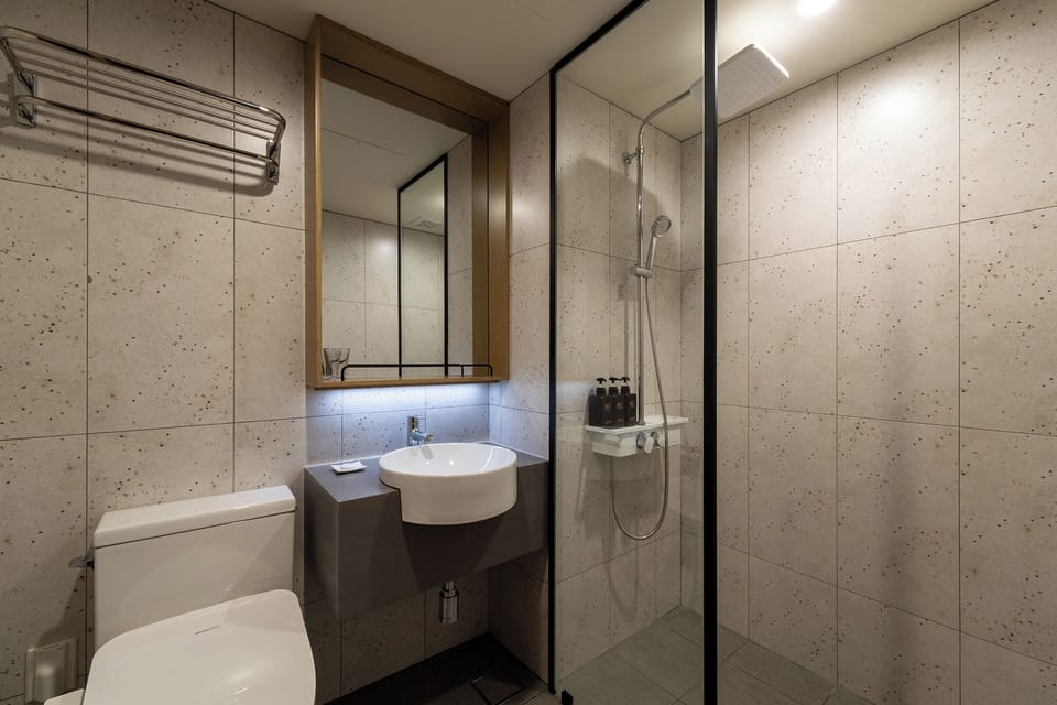 Family Twin Room, Sea View | Bathroom | Shower, hair dryer, towels, soap