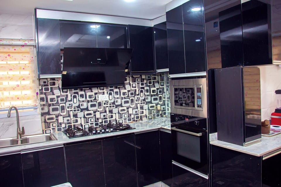 Economy Apartment, Balcony, City View | Private kitchen | Fridge, microwave, oven, stovetop