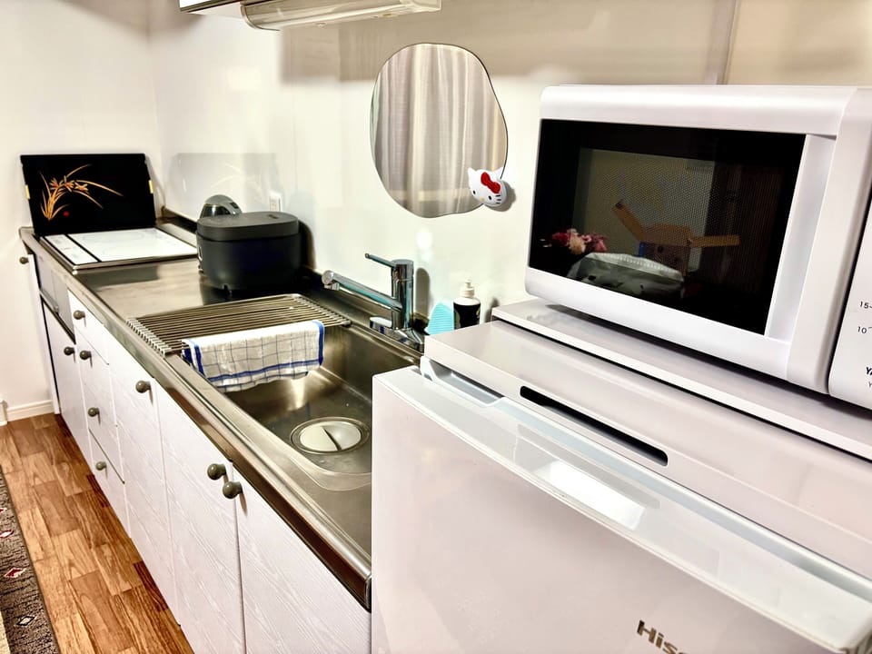 Family Room Non Smoking | Private kitchen | Full-size fridge, microwave, stovetop, rice cooker