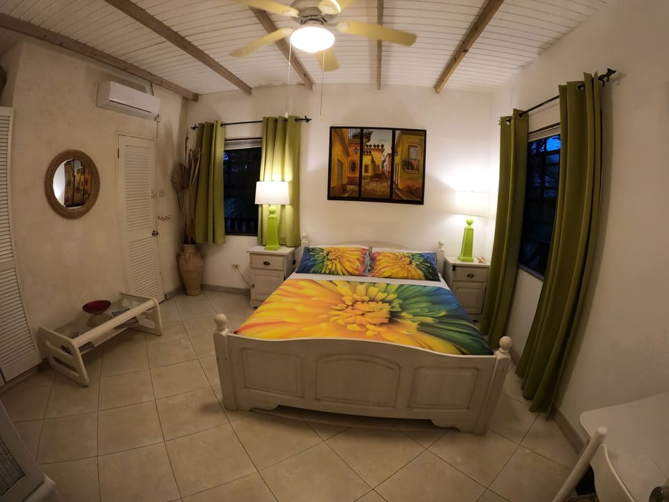 Apartment, 1 Bedroom, Kitchen, Partial Sea View | 1 bedroom, premium bedding, in-room safe, individually decorated