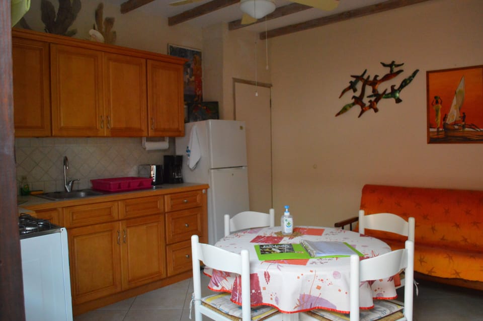 Apartment, 1 Bedroom, Kitchen, Partial Sea View | Private kitchen | Fridge, microwave, coffee/tea maker, toaster
