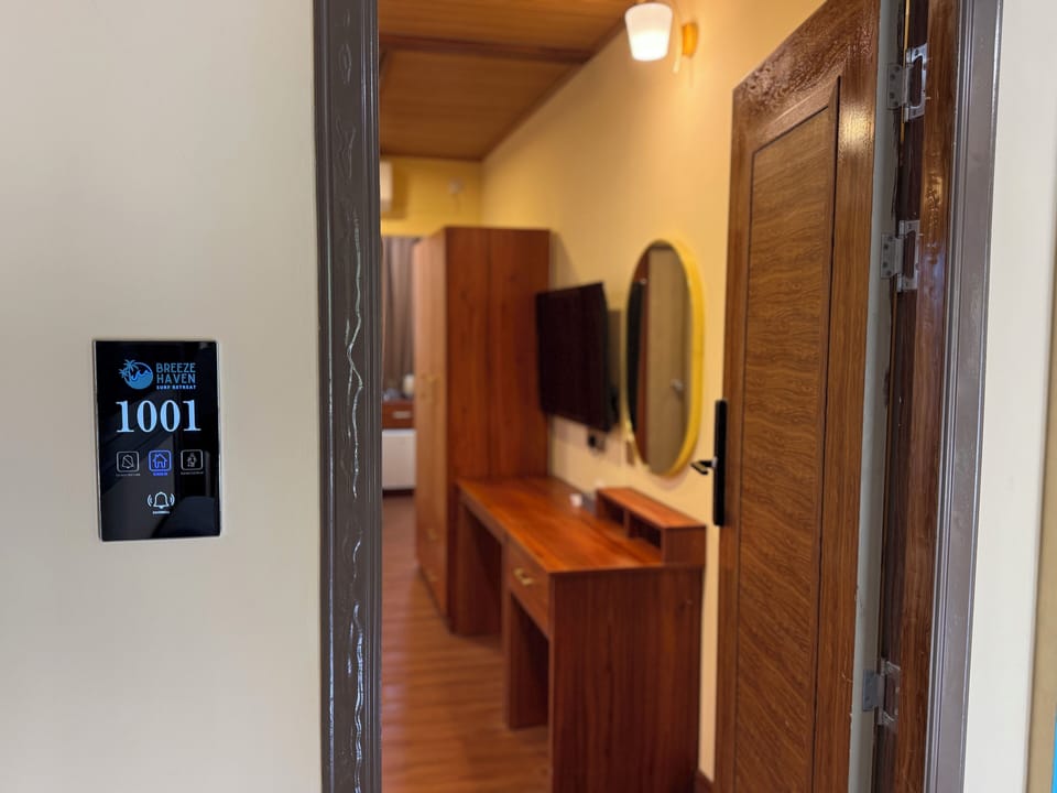 Family Triple Room | In-room safe, laptop workspace, blackout drapes, iron/ironing board