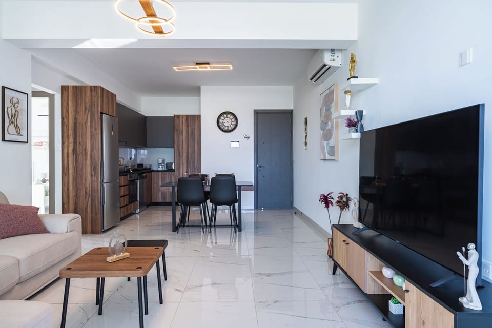 Apartment, 2 Bedrooms, Kitchen, City View | Living room | 55-inch Smart TV with digital channels, streaming services