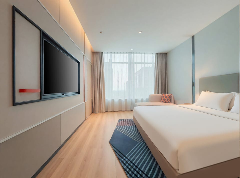 1 Bedroom Suite Stocked Minibar Included | Down comforters, desk, laptop workspace, blackout drapes