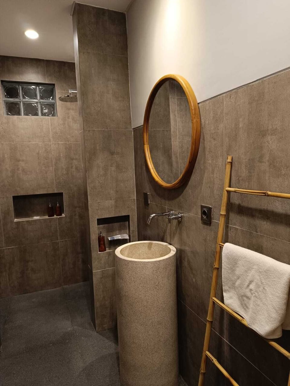 Shower, rainfall showerhead, towels, soap