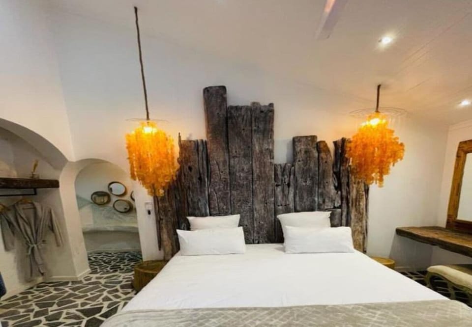 Deluxe Double Room, Patio, Pool View | In-room safe, blackout drapes, soundproofing, iron/ironing board