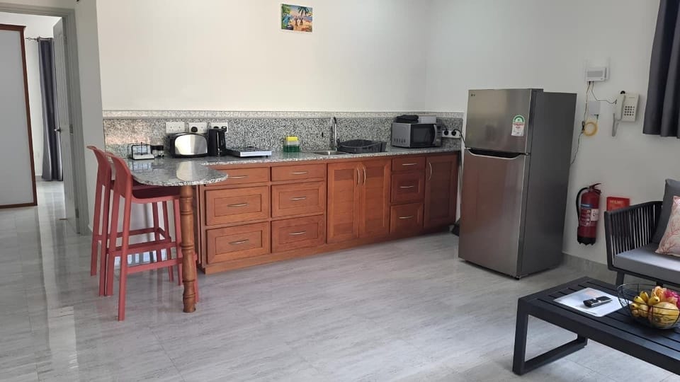 Deluxe Double Room | Private kitchen | Full-size fridge, stovetop, toaster, rice cooker