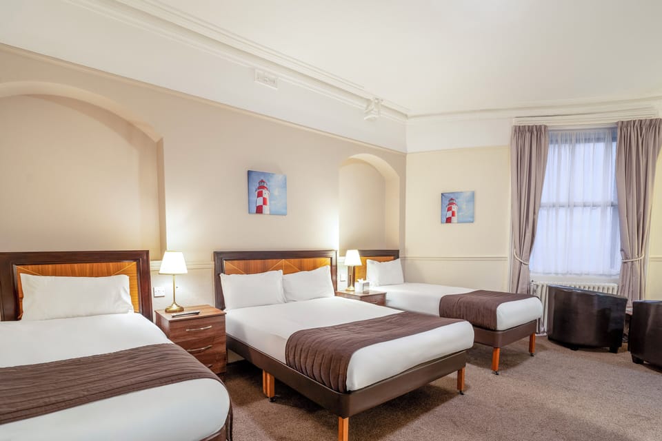 Family Sea View Sleeps 4 | Individually decorated, individually furnished, desk, laptop workspace