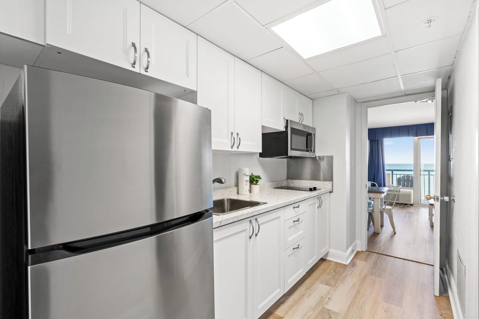 Condo, 2 Bedrooms, Balcony, Oceanfront (939/940) | Private kitchen | Full-size fridge, microwave, stovetop, dishwasher