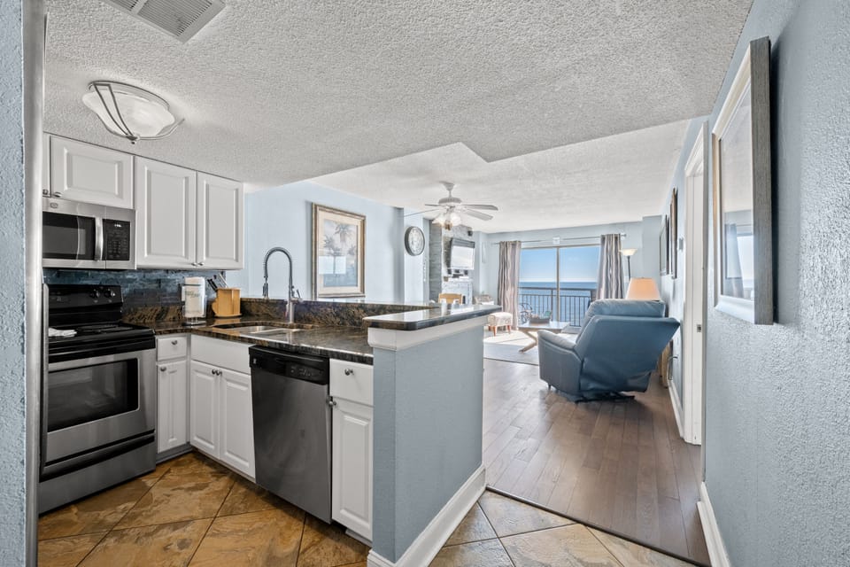 Condo, 2 Bedrooms, Fireplace, Oceanfront (601 - Corner Unit) | Private kitchen | Full-size fridge, microwave, stovetop, dishwasher