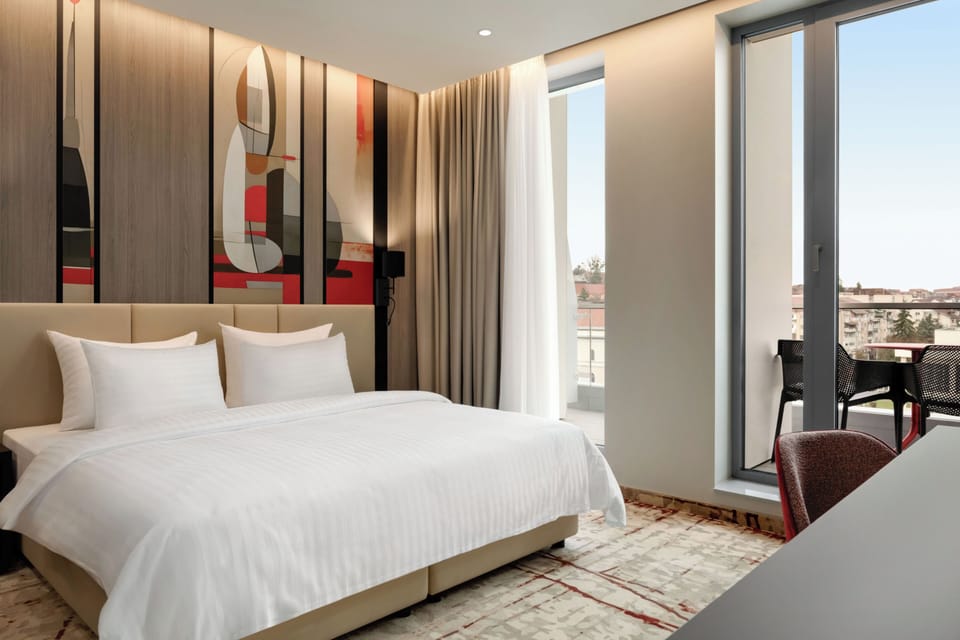 Hypo-allergenic bedding available, minibar, in-room safe, desk