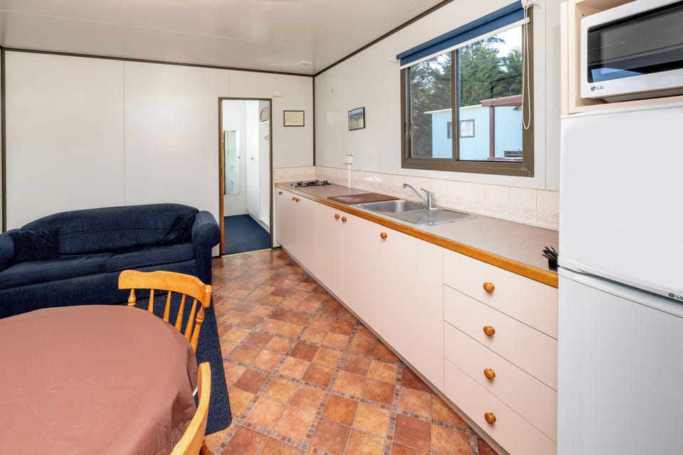 Classic Cabin | Living area | 32-inch LCD TV with cable channels