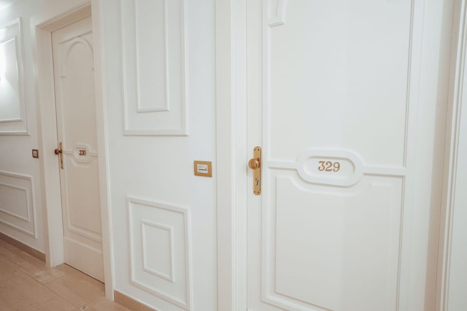 Camere Comunicanti, Balcone Vista Mare | Premium bedding, minibar, in-room safe, individually decorated