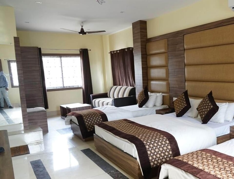 AC DELUXE (TRIPLE BED) | Premium bedding, desk, laptop workspace