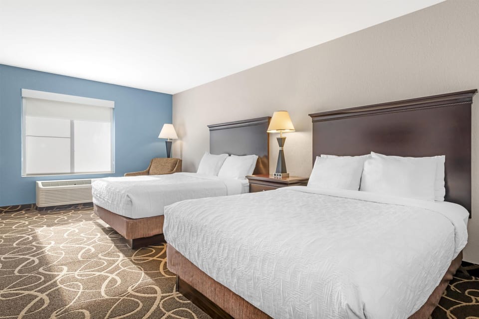 Standard Room, 2 Queen Beds, Non Smoking, Refrigerator & Microwave | In-room safe, iron/ironing board, free cribs/infant beds, rollaway beds