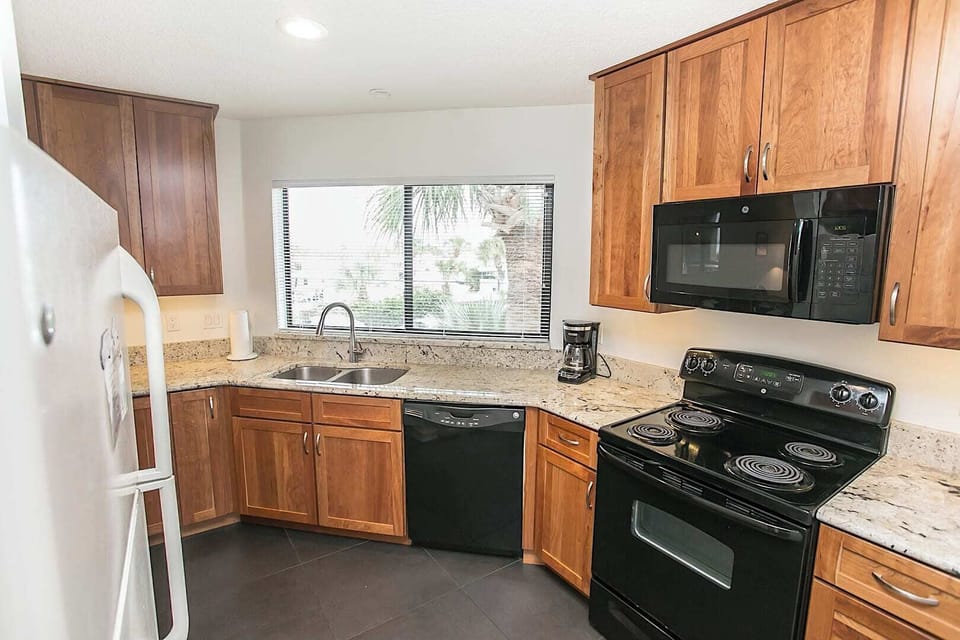 Condo, Multiple Beds, Hot Tub, Ocean View (Hibiscus C202) | Private kitchen | Coffee/tea maker