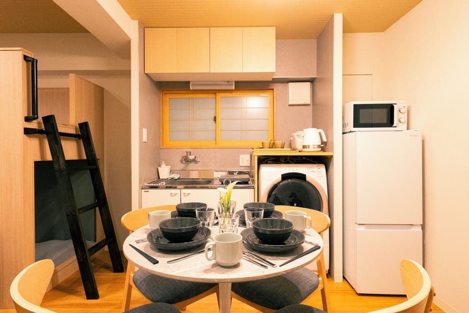 Family Apartment, City View | Desk, laptop workspace, iron/ironing board, free WiFi
