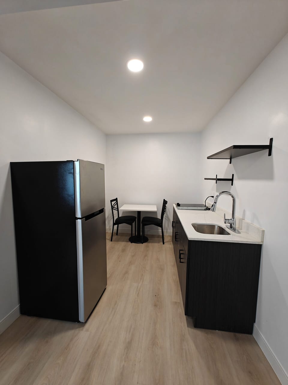 Apartment Studios | Desk, laptop workspace, blackout drapes, soundproofing