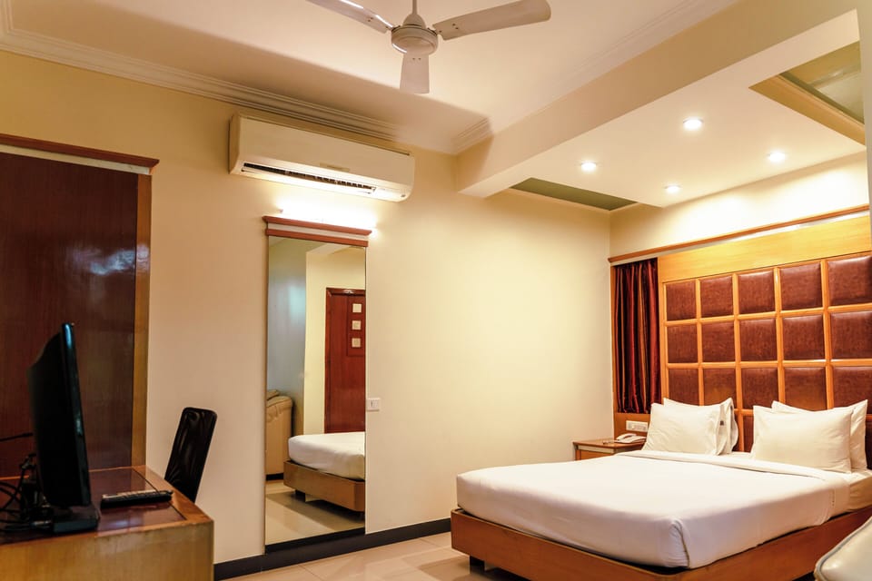 Deluxe Double Room, City View | Desk, laptop workspace, iron/ironing board, free WiFi