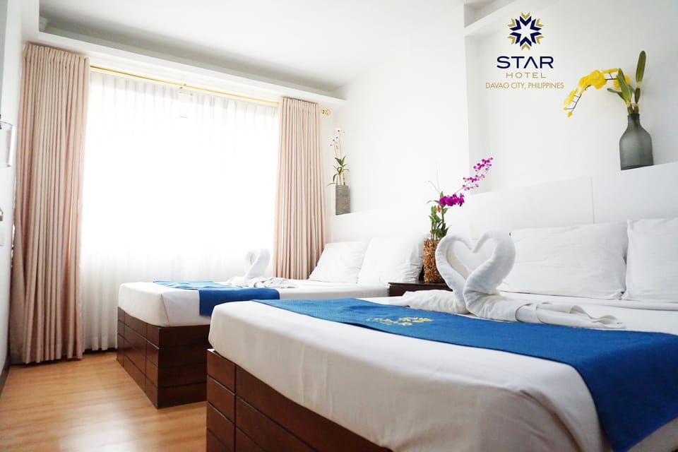 Quadruple Room | Desk, rollaway beds, bed sheets