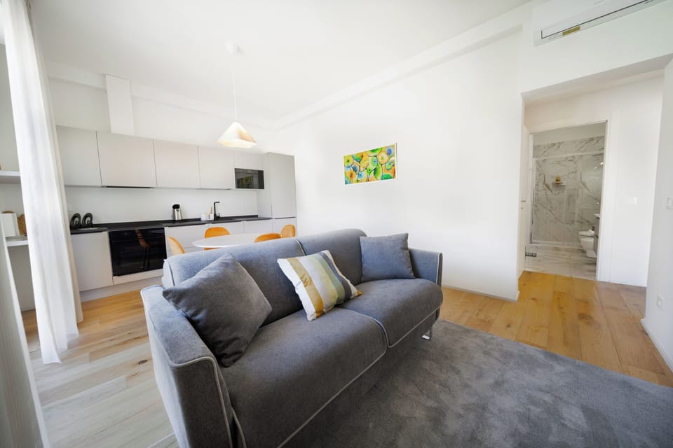 Comfort Apartment, Balcony | Living area | Flat-screen TV