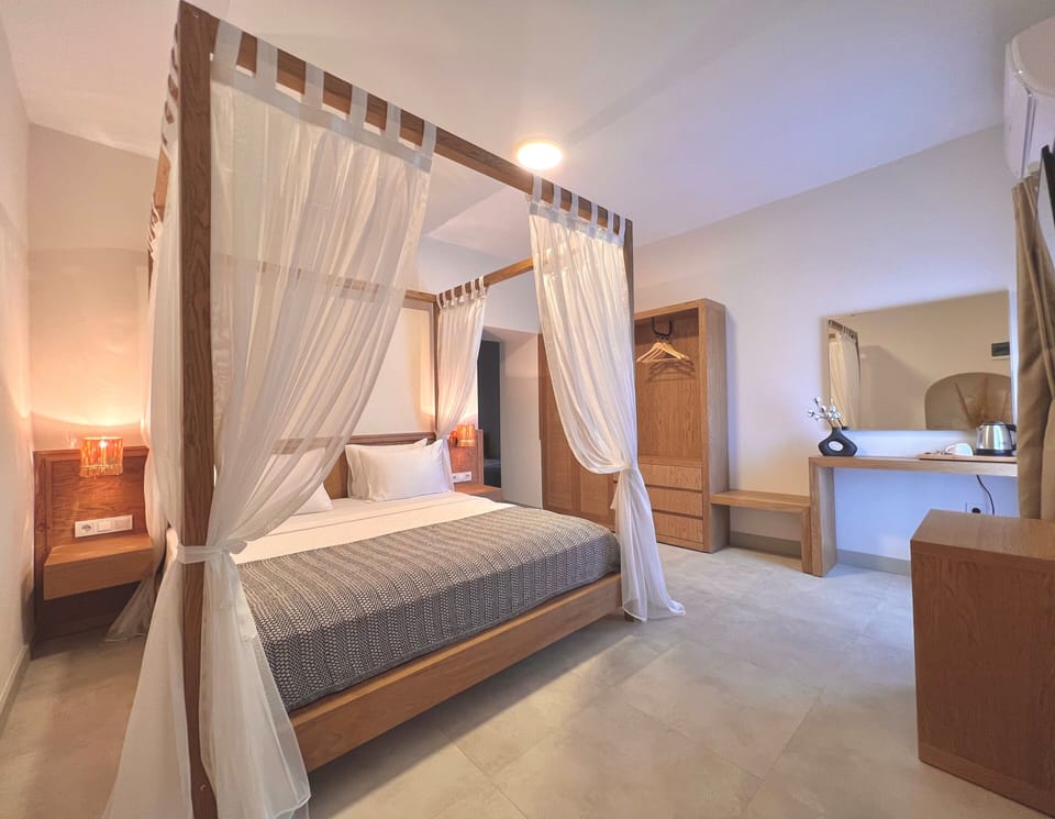 Exclusive Suite, 2 Bedrooms, Patio, Beachside | In-room safe, free WiFi, bed sheets