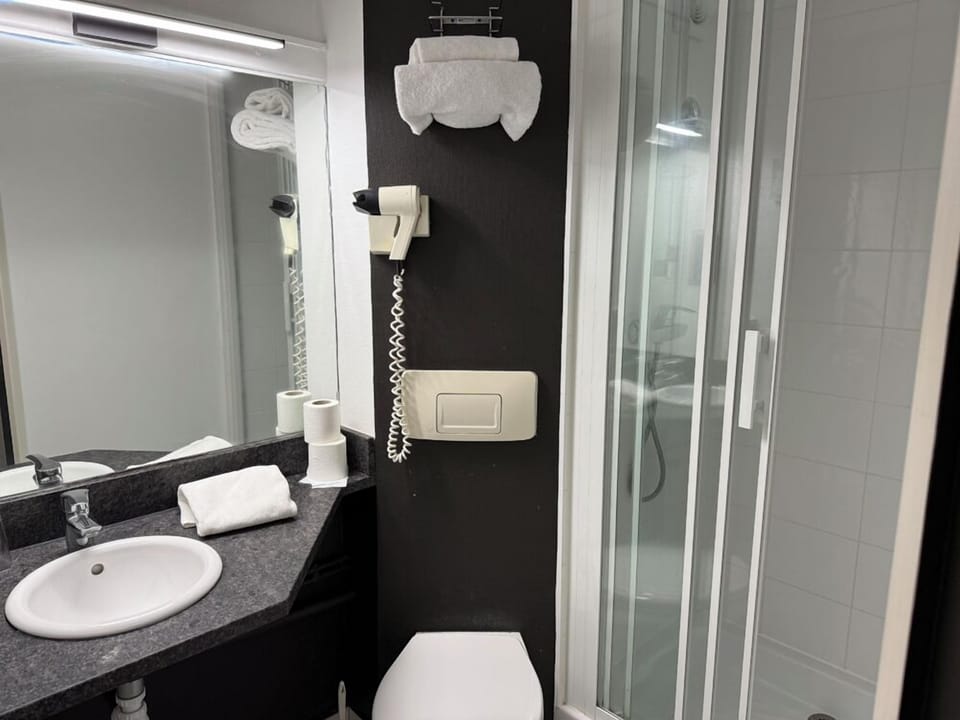 Shower, free toiletries, hair dryer, towels