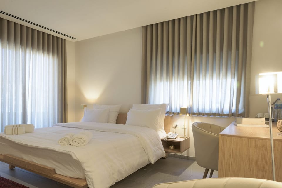 Deluxe Double Room, Balcony, City View | In-room safe, soundproofing, iron/ironing board, free WiFi