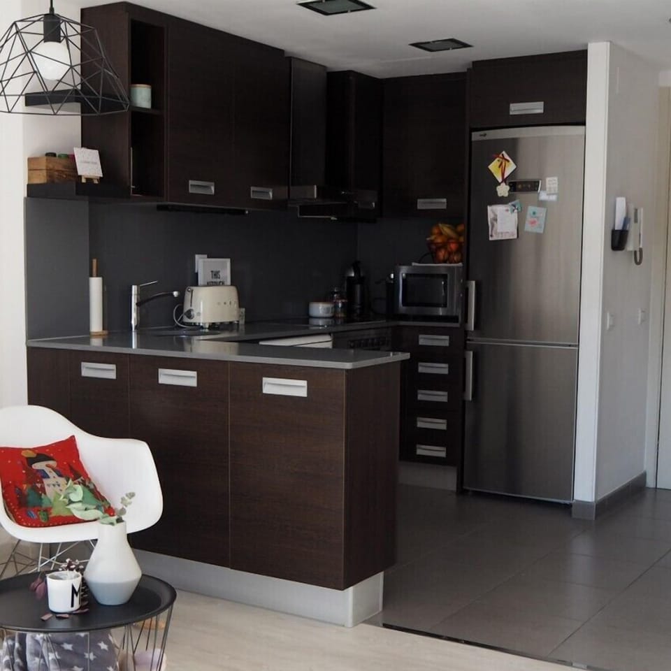 Fridge, microwave, cookware/dishes/utensils