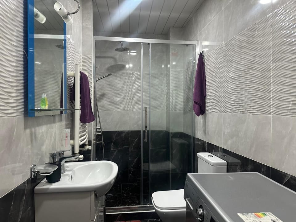 Deluxe Double Room, Courtyard View | Bathroom | Free toiletries, hair dryer, slippers, towels