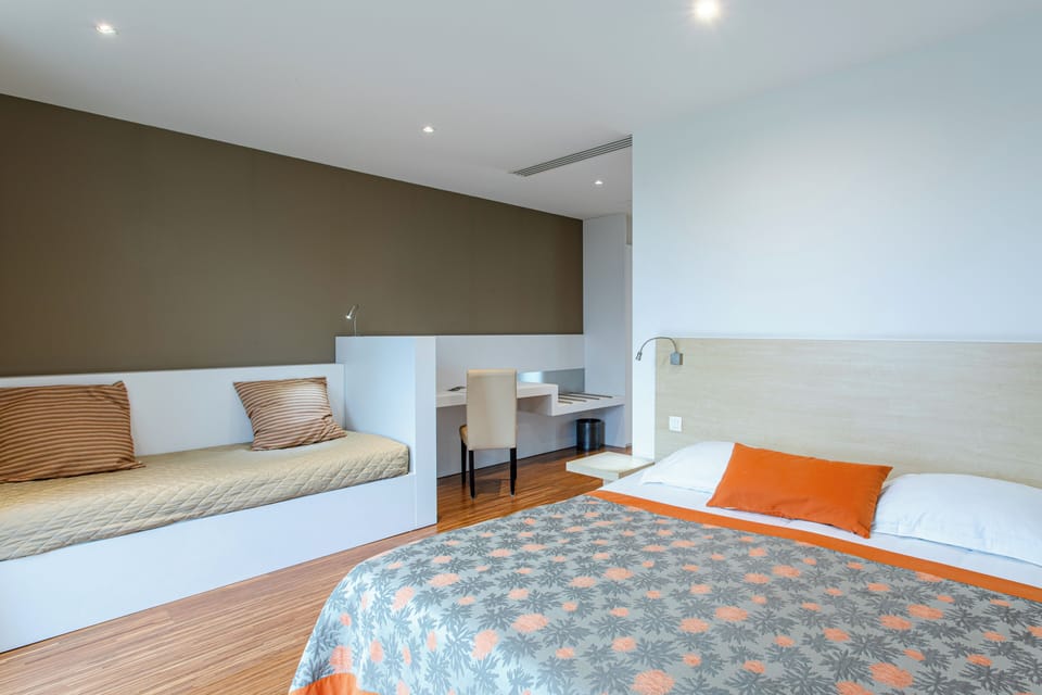 Family Triple Room, Balcony | Desk, soundproofing, free WiFi, bed sheets