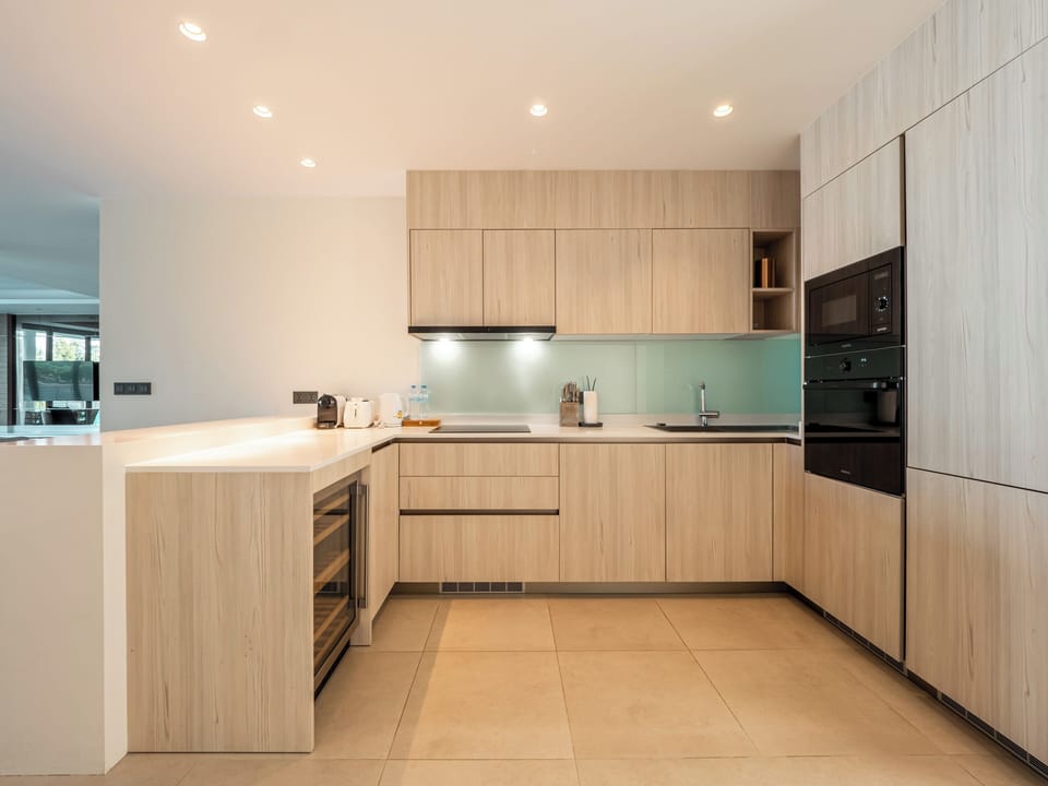 Comfort Apartment | Private kitchen | Espresso maker, electric kettle, highchair