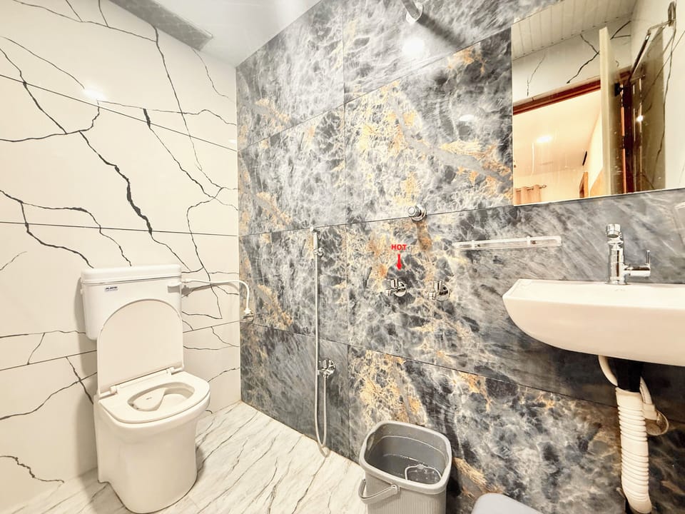 Superior Triple Room | Bathroom | Shower, rainfall showerhead, bidet, soap