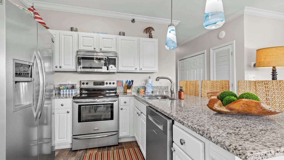 Condo, Multiple Beds, Balcony (Romar Lakes C305) | Private kitchen | Fridge, microwave, oven, stovetop