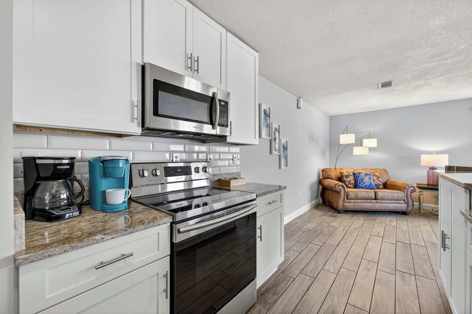 Condo, 1 King Bed with Sofa bed, Patio, Garden View (Miramar Beach Oasis) | Private kitchen | Fridge, microwave, oven, stovetop