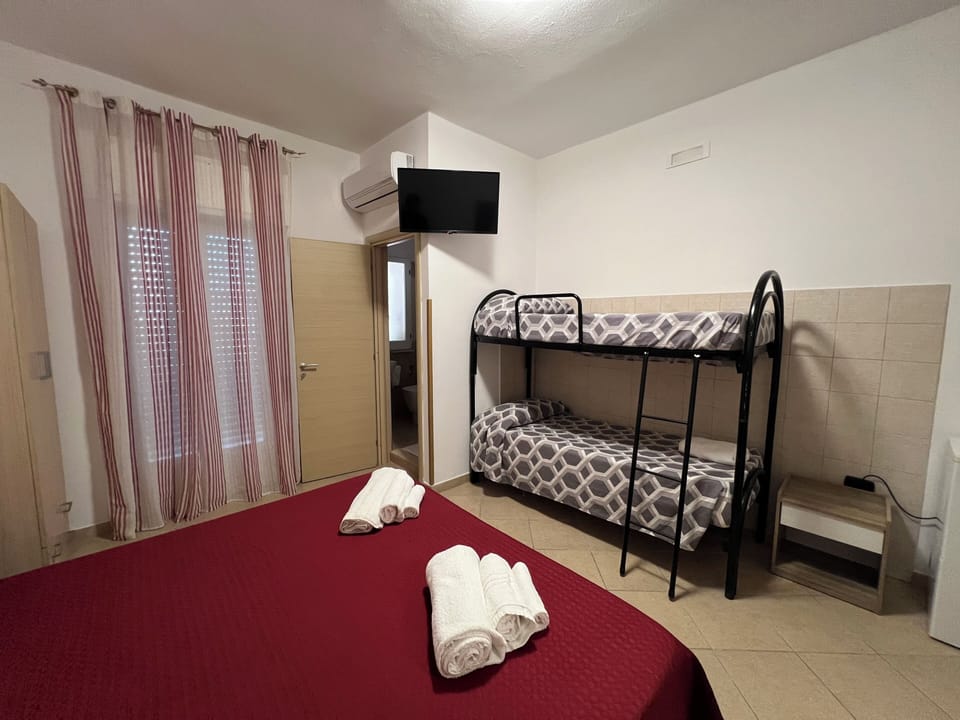 Quadruple Room, Balcony, Partial Sea View | Desk, blackout drapes, free WiFi