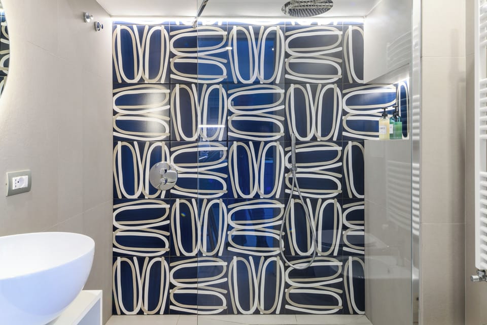 Exclusive Apartment, Garden View | Bathroom | Shower, hair dryer, bidet, towels