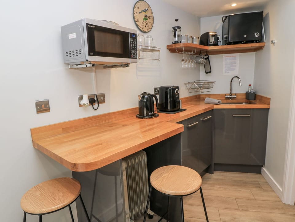 Fridge, microwave, toaster, cookware/dishes/utensils