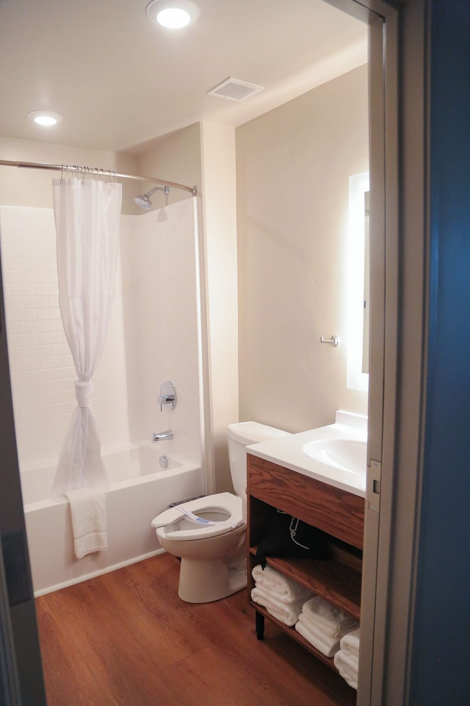 Combined shower/tub, hair dryer, towels, soap