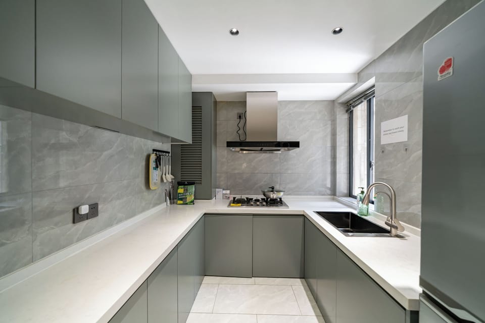 Senior Apartment | Private kitchen | Fridge, cookware/dishes/utensils, paper towels