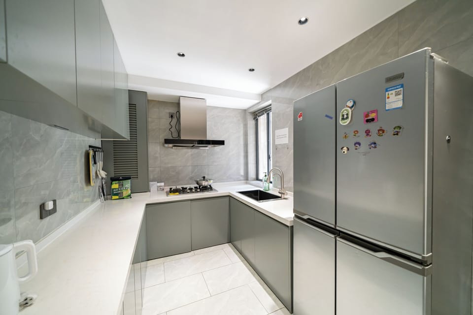 Senior Apartment | Private kitchen | Fridge, cookware/dishes/utensils, paper towels